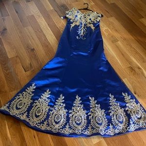 Beautiful dress, used once for a wedding,it’s royal blue and gold,trumpet skirt